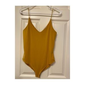 mustard colored bodysuit